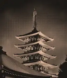 Ancient Japanese pagoda illuminated at night