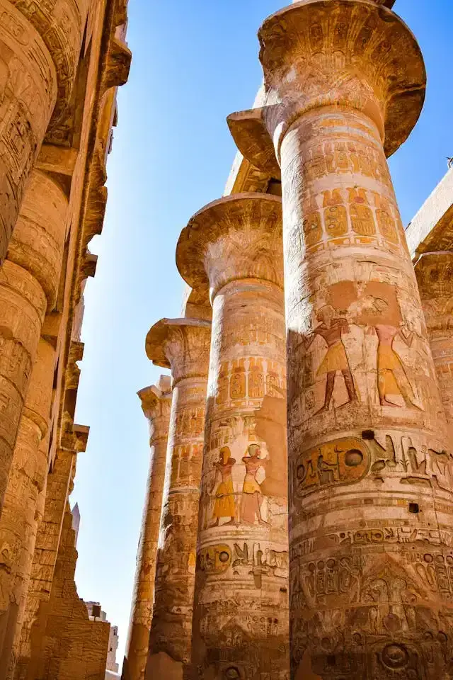 Ancient Egyptian columns with hieroglyphic carvings in Luxor