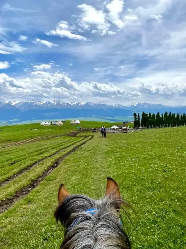 Horse riding across the Kyrgyz highlands